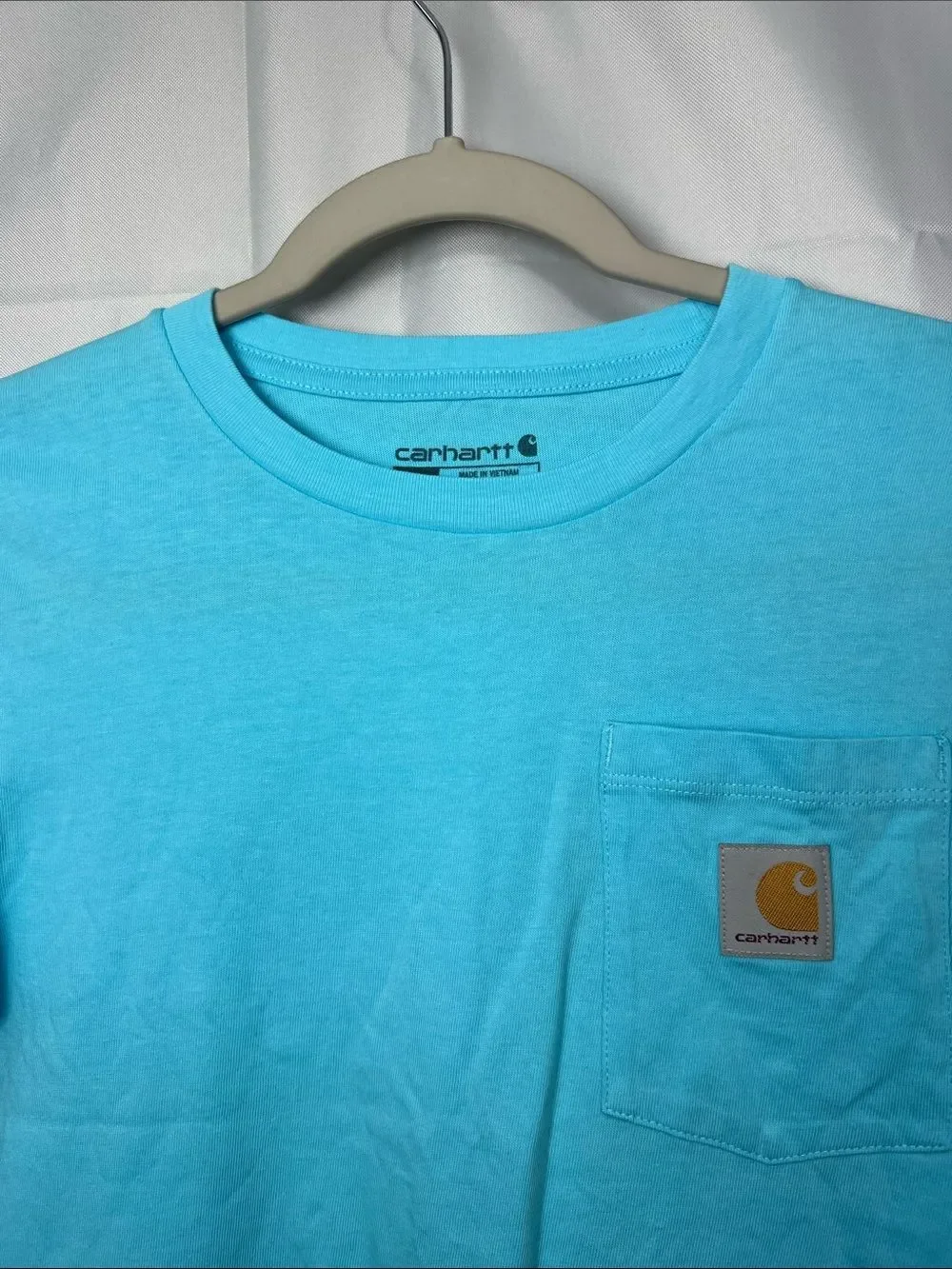 Carhartt blue pocket t-shirt with camping graphic on back